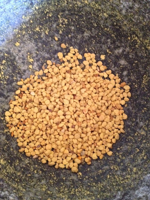 Bee Pollen about to get ground into dust