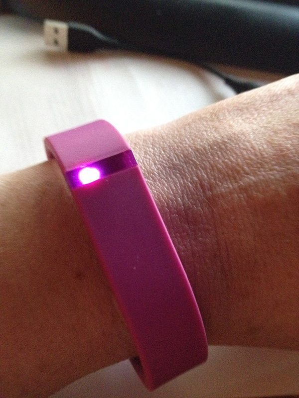 Close up of my Fitbit Flex. You tap it to show you the dots. The dots represent how many steps you have done. A full row of dots indicates you have completed your 10,00 steps or more! Half way shows that you have done at least 5,000.