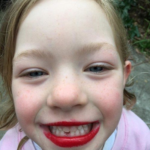 She is so happy her tooth finally fell out. The red lippy was for a disco birthday party the kids were off to on the weekend.