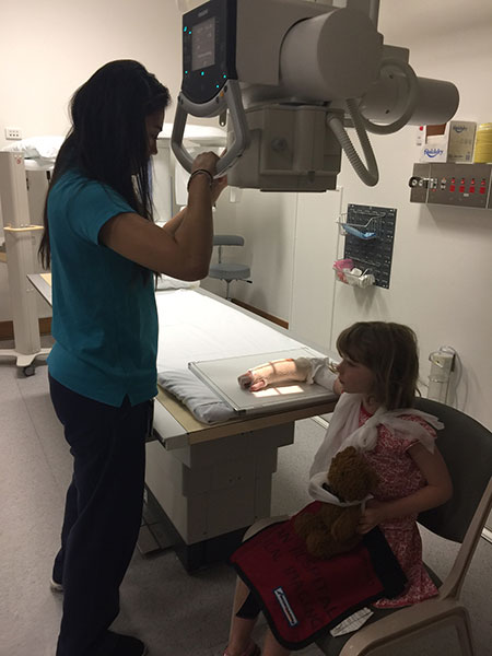 Getting the final x-ray to determine if all bones are in the right place. All was good and Lillian could get more plaster and then come home.