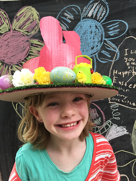 Lillian loves her new Easter Hat. 
