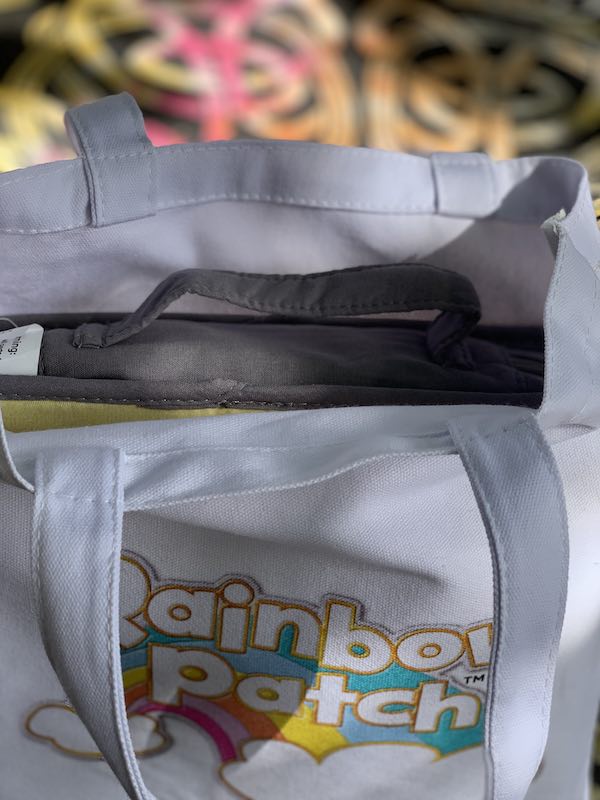 The Rainbow Patch PlayBook fits easily into the tote bag and allows you to take it with you everywhere.